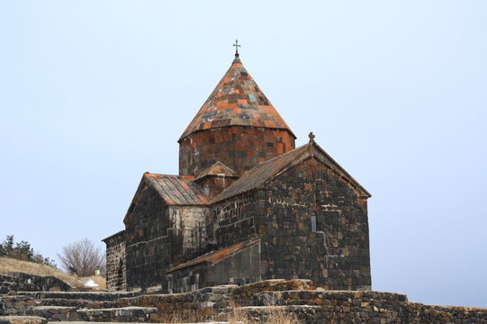 View of a beautiful  Sevanavank church in Sevan, on the lake Sevan, Armenia in winter with a blue sky.