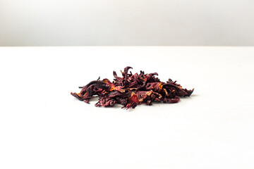 White Wooden Table with Hibiscus Flower / Roselle (Hibiscus sabdariffa)