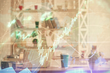 Double exposure of stock market graph drawing and office interior background. Concept of financial analysis.