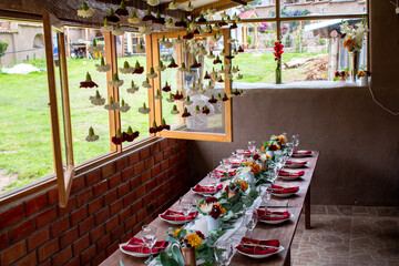 A decorated dinner table for a wedding reception or party