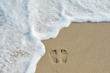 footprints on the beach