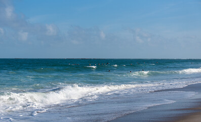 Fototapeta na wymiar Surfing at Wrightsville Beach Before Hurricane Isaias