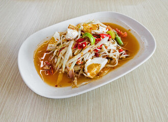 Papaya salad with salted eggs