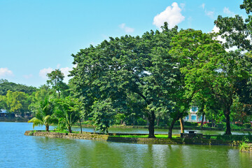 Lake and trees at Ninoy Aquino parks and wildlife center in Quezon City, Philippines