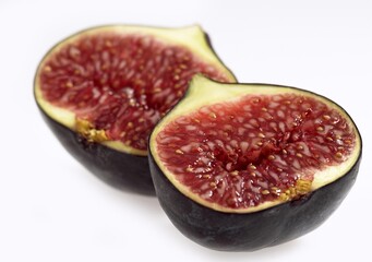 FRESH FIG AGAINST WHITE BACKGROUND