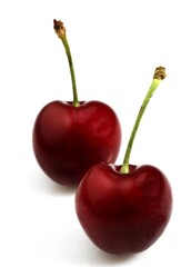 CHERRY AGAINST WHITE BACKGROUND