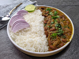A platter of Indian red Kidney beans curry or Rajma Masala and rice