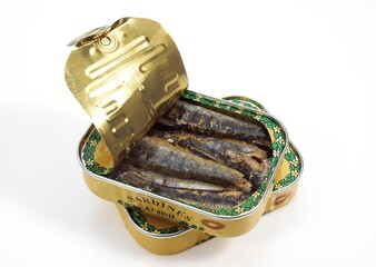 TIN OR CAN OF SARDINES AGAINST WHITE BACKGROUND