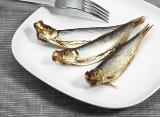 SPRAT sprattus sprattus, SMOKED FISH ON PLATE