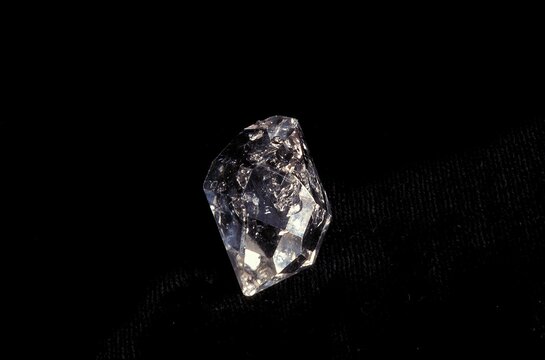 HERKIMER DIAMOND AGAINST BLACK BACKGROUND