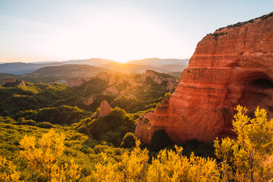 Majestic view of the cliff and the sun valley and mountains.