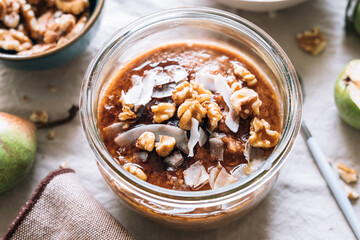 Porridge with walnuts and shredded coconuts