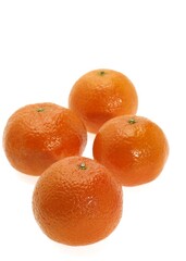 CLEMENTINE FRUIT citrus reticulata AGAINST WHITE BACKGROUND