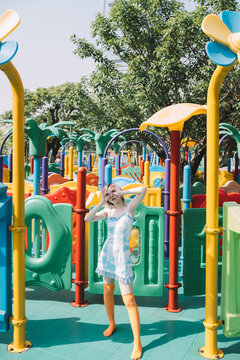 portrait of young fashion woman on play field