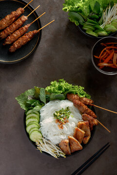 Rice noodles with grilled meat and spring roll