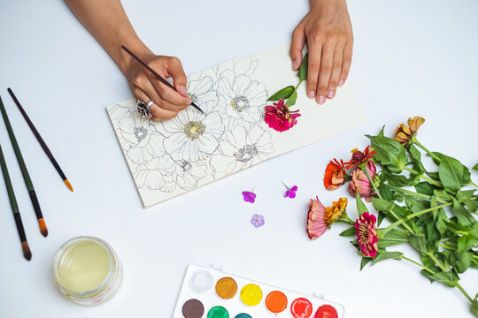 Overhead View Of An Artist Drawing Flowers