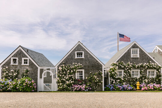 Seaside Cottages and American Flag on Home on Nantucket Island Massachusetts