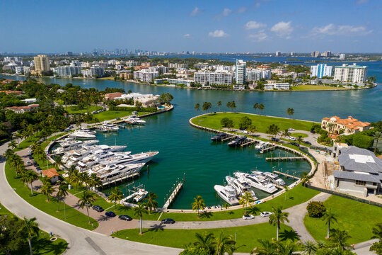 Bal Harbour marina with luxury yachts Miami Beach FL aerials