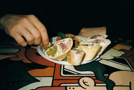 Eating falafel in pita dish