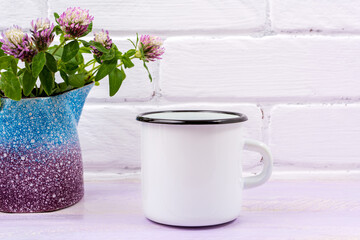 White campfire enamel mug mockup with pink clover