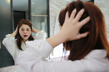 Fototapeta premium girl wake up, taking care the hair