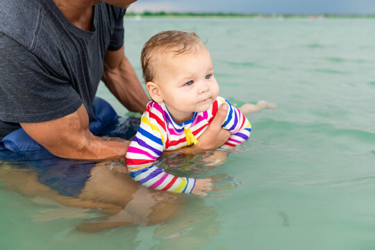 Dad Holding Baby