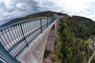 Fototapeta na wymiar Bridge on the border of Norway and Sweden. Osfold Region, Norway