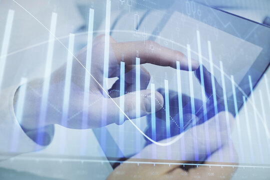 Multi exposure of man's hands holding and using a phone and financial chart drawing. Market analysis concept.