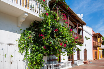 Fototapeta na wymiar Colombia, Scenic colorful streets of Cartagena in historic Getsemani district near Walled City (Ciudad Amurallada)