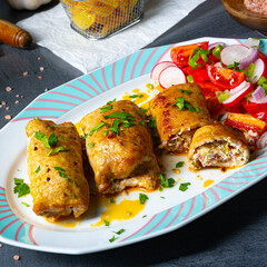 Vegetable roulade from roast  pork loins with salads