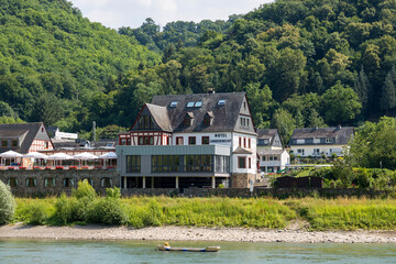 Fototapeta na wymiar View of residential buildings Kamp-Bornhofen on the banks of the Rhine