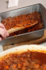 Leveling meat sauce. Making Lasagna Bolognese Series.