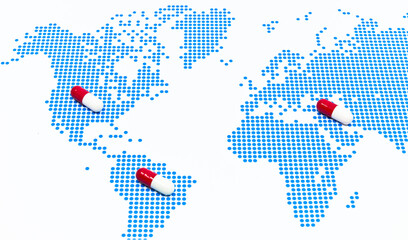 Red capsules on the blue dots pattern world map. A novel drug for global pandemic prevention and treatment against infectious diseases