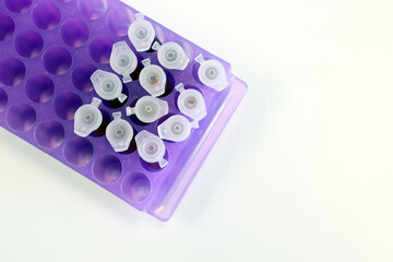 Micro Centrifuge tube with blood sample in solution, for testing anti-biotic with tips micropipette...
