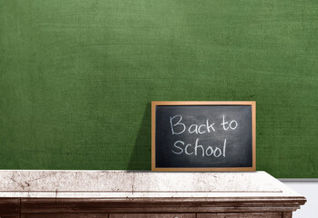 Small blackboard with the text of back to school