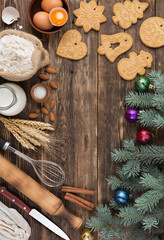 christmas baking background culinary background with spices and Christmas winter ingredients for baking on a vintage wooden table. Top view with copy space