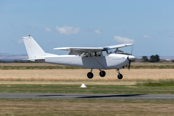 Fototapeta na wymiar Single engine aircraft on approach to land.