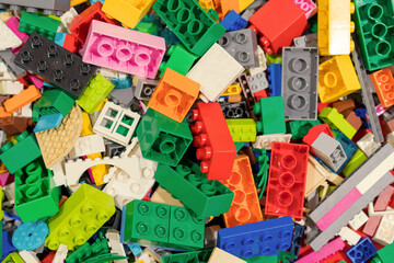 Fototapeta na wymiar colorful plastic toys blocks on table for Children