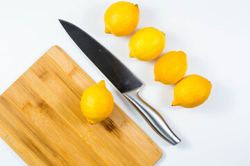 Closeup image of chief knife and lemon