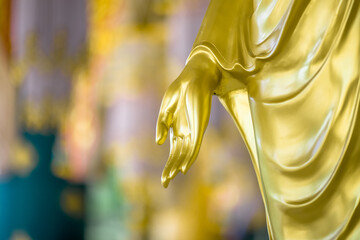 Blurred abstract background of sculptures seen at temples or religious tourist sites (Phaya Nak,...