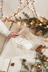Christmas stollen on wooden background. Traditional Christmas festive pastry dessert. Stollen for Christmas.