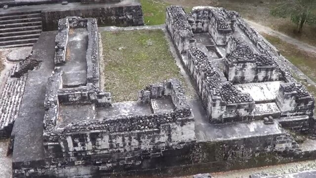 North acropolis south west corner structures at Yaxha mayan ruins Guatemala.