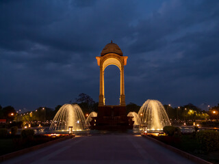 a night shot the canopy and fountain near india gate in new delhi