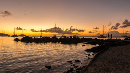 Beautiful cloudy sunset in the harbor in Martinique