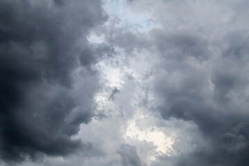 Background of dark and gray clouds in the sky before rain.