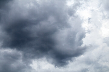 Background of dark and gray clouds in the sky before rain.