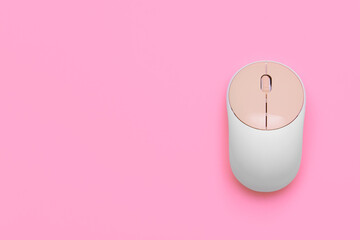 Modern computer mouse on color background