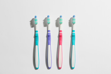 Tooth brushes on light background