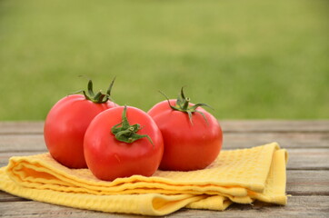 tomatoes on a wooden table
