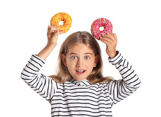 Funny little girl with donuts on white background